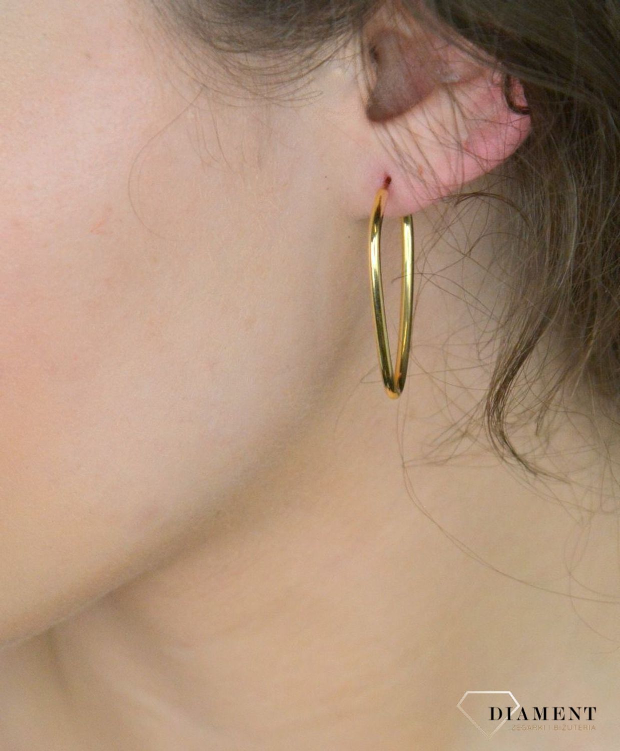 Kolczyki złote owalne pr 585, C5LBFLEX-2-BAR1 OR205574 Złote kolczyki owalne – klasyczna elegancja. Stylowe kolczyki wykonane z wysokiej jakości złota próby 585, o wadze 1,60 g. 1.jpg